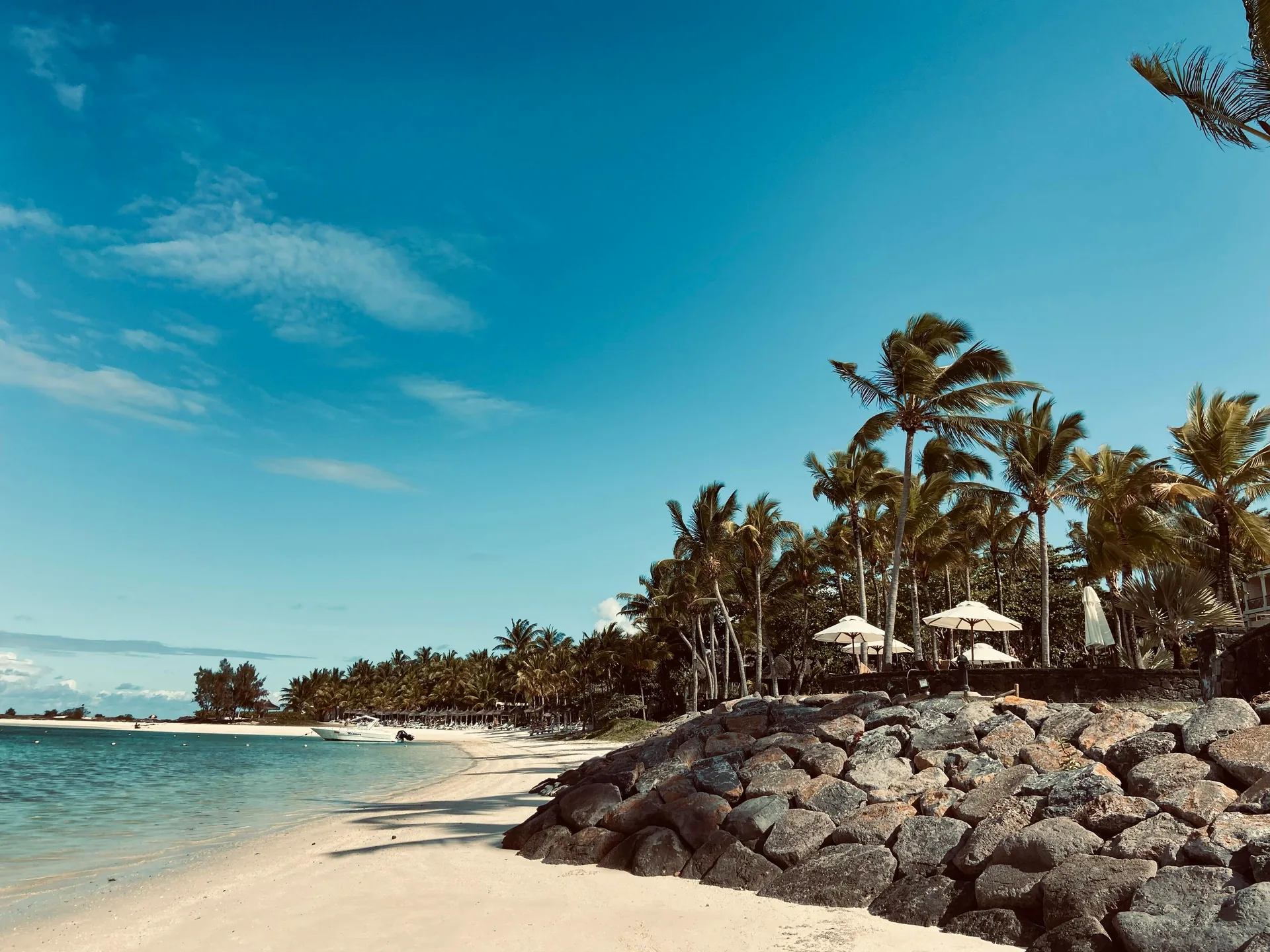 View of the turquoise lagoon and mountains of Mauritius